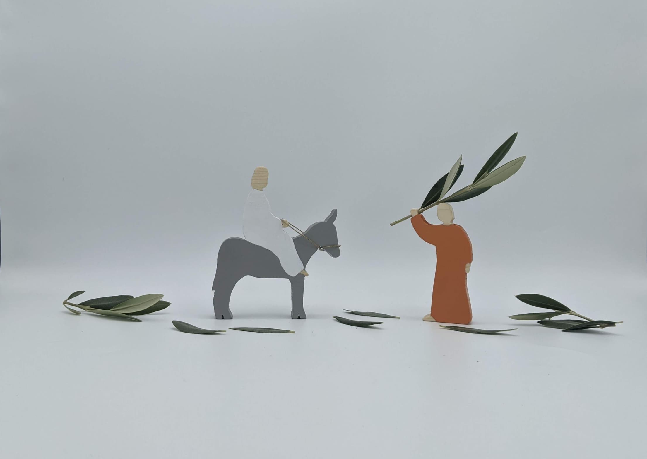Jésus sur l'âne, homme avec rameaux