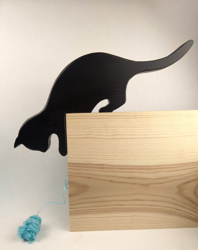 chat prêt à sauter noir
