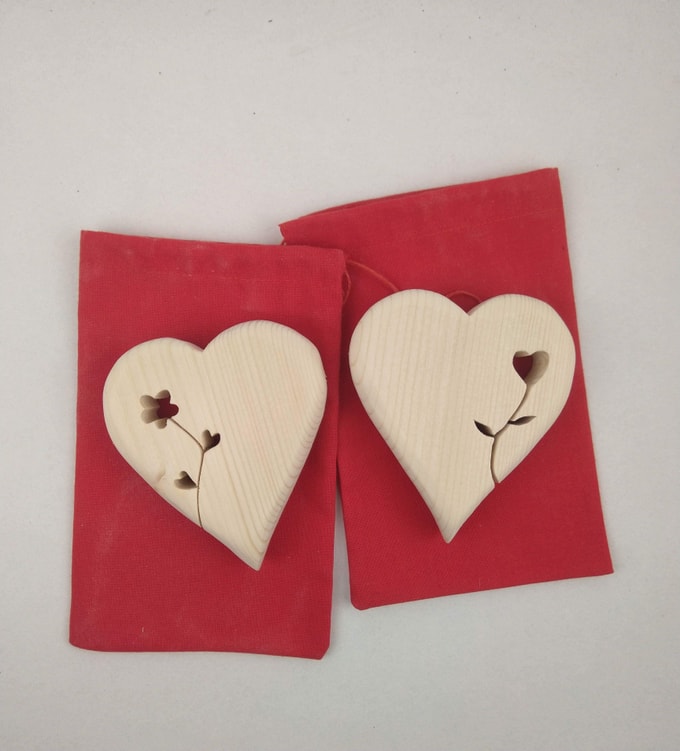 2 coeurs avec fleur