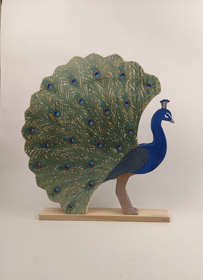paon bleu de profil