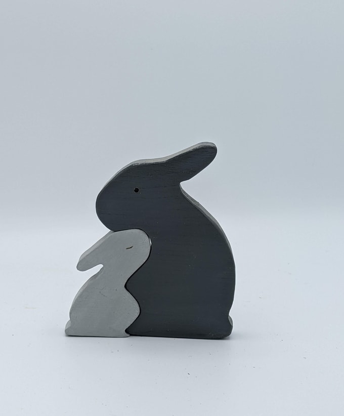 2 lapins gris enlacés