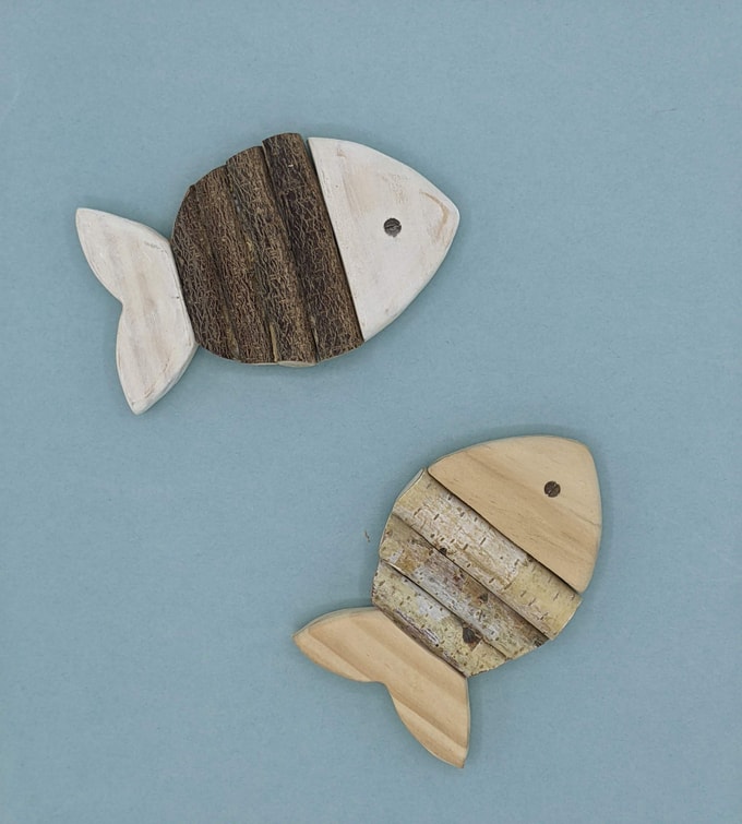 2 poissons en rondin de bois