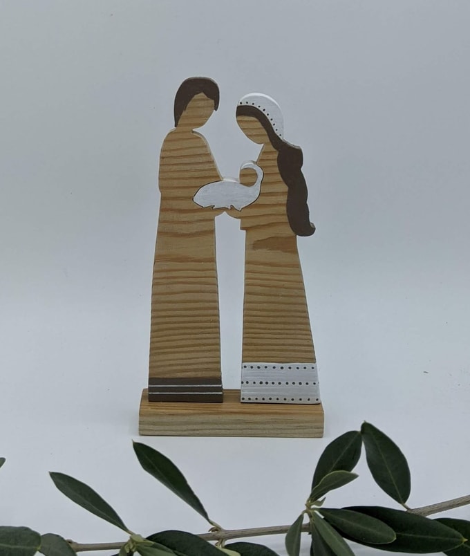 Joseph et Marie portant Jésus