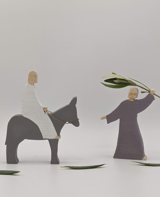 Jésus sur l'âne, homme avec rameaux